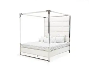 Elegant canopy bed with pillows