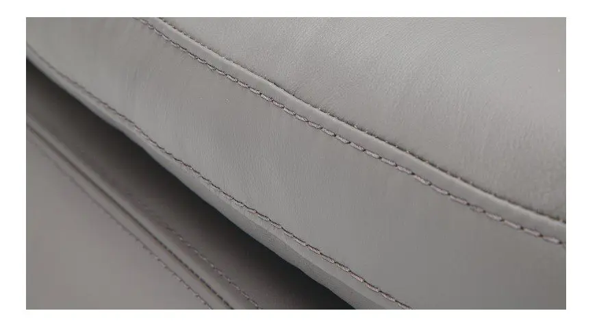 Detailed view of gray leather upholstery