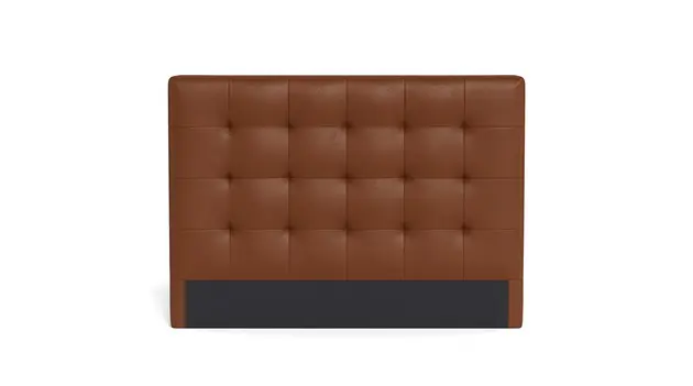 Upholstered headboard in brown leather