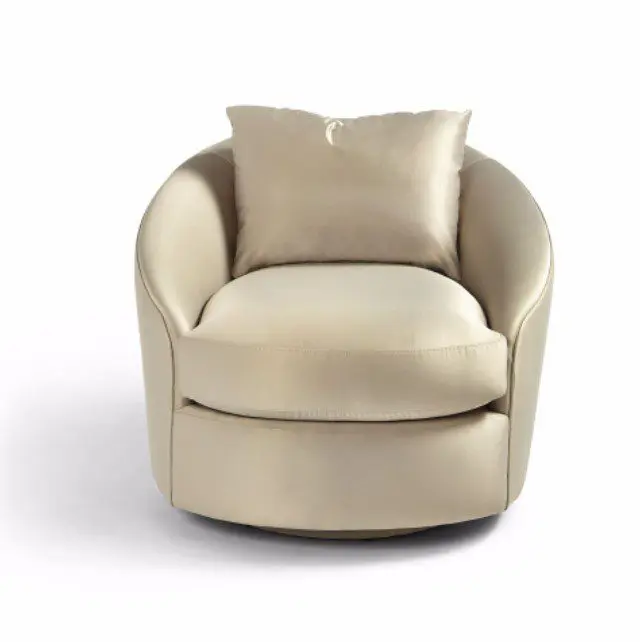 Plush beige chair with pillow