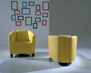 Modern chairs and abstract wall decor