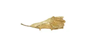 Golden leaf sculpture on white background